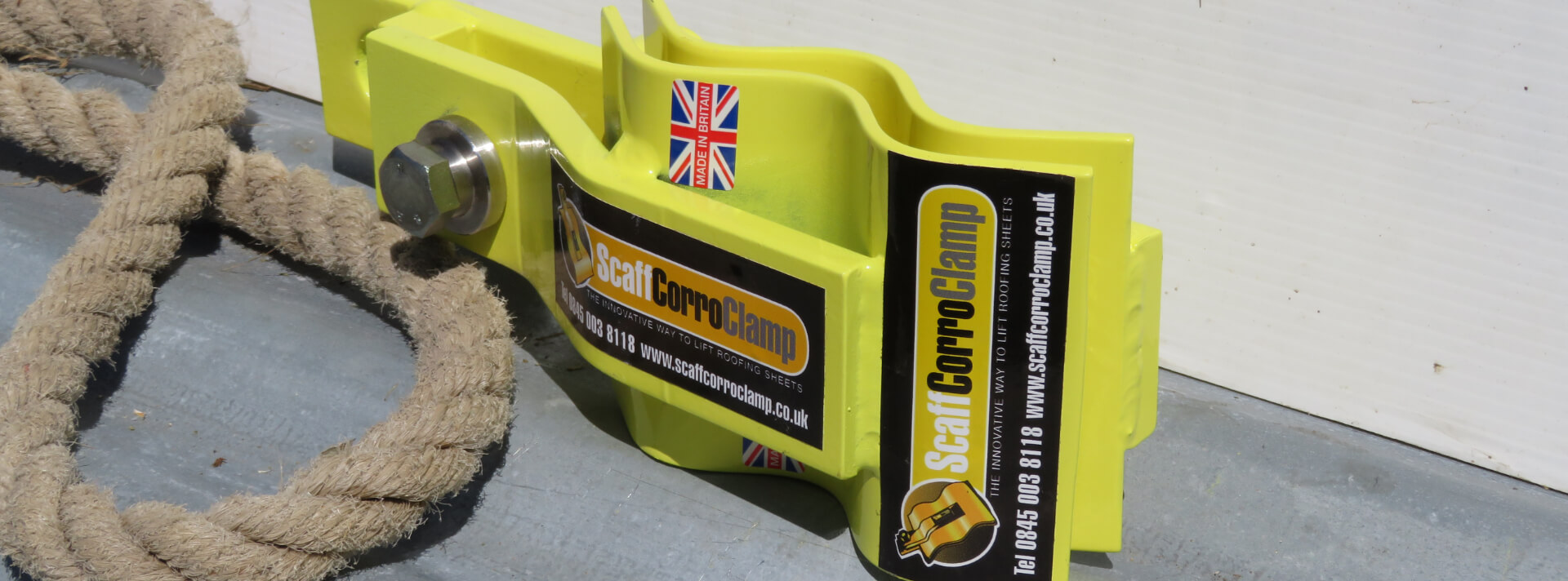 ScaffCorroClamp secured to corrugated roofing sheets